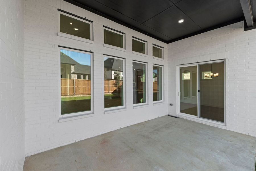 Exterior details and patio area of a home in Wildflower Ranch, Justin (Image 3). Exterior details and patio area of a home in Wildflower Ranch, Justin (Image 3).