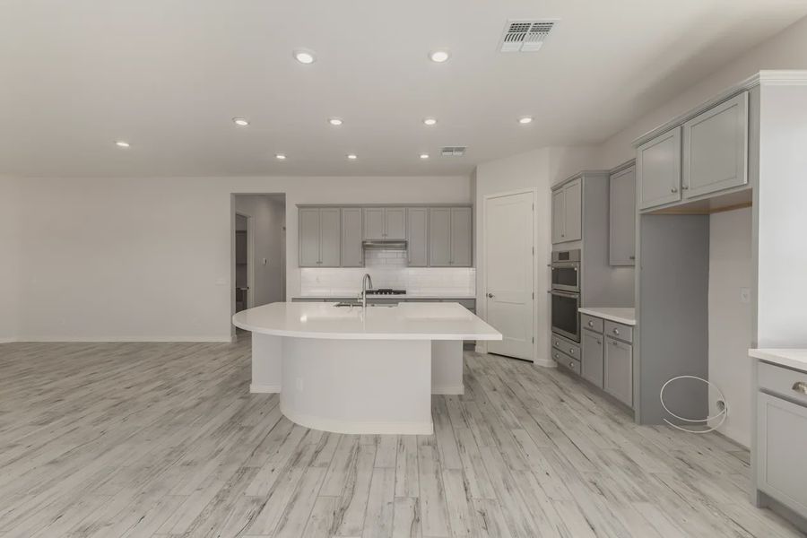 Furnished interior view inside a new home in Valencia at Granite Vista, Waddell (Image 5).
