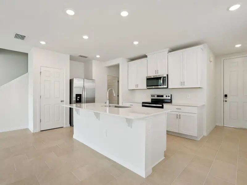 Furnished interior view inside a new home in Cagan Crossings West, Clermont (Image 3).