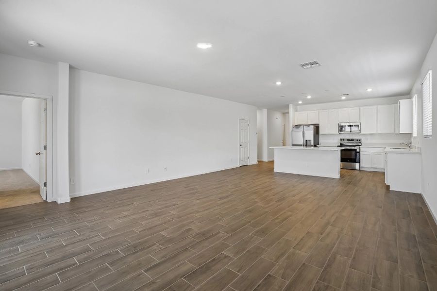 Great room and kitchen. Representative images and renderings are for illustrative purposes. Actual structural options and design finishes of home may vary. Great room and kitchen. Representative images and renderings are for illustrative purposes. Actual structural options and design finishes of home may vary.