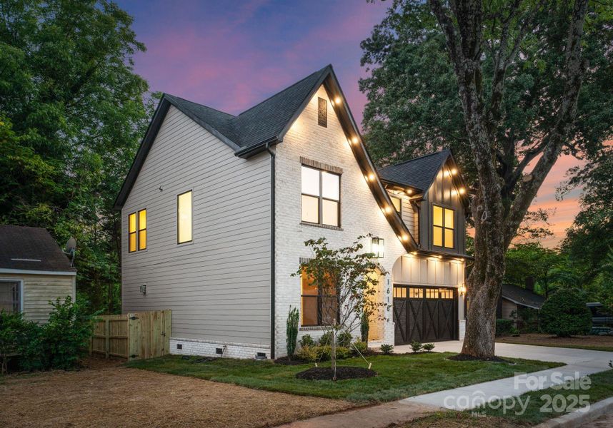 Front exterior of a new home in , Charlotte, NC, highlighting curb appeal (Image 24).