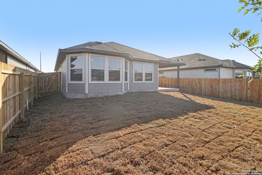 Exterior details and patio area of a home in Catalina, Converse (Image 22).