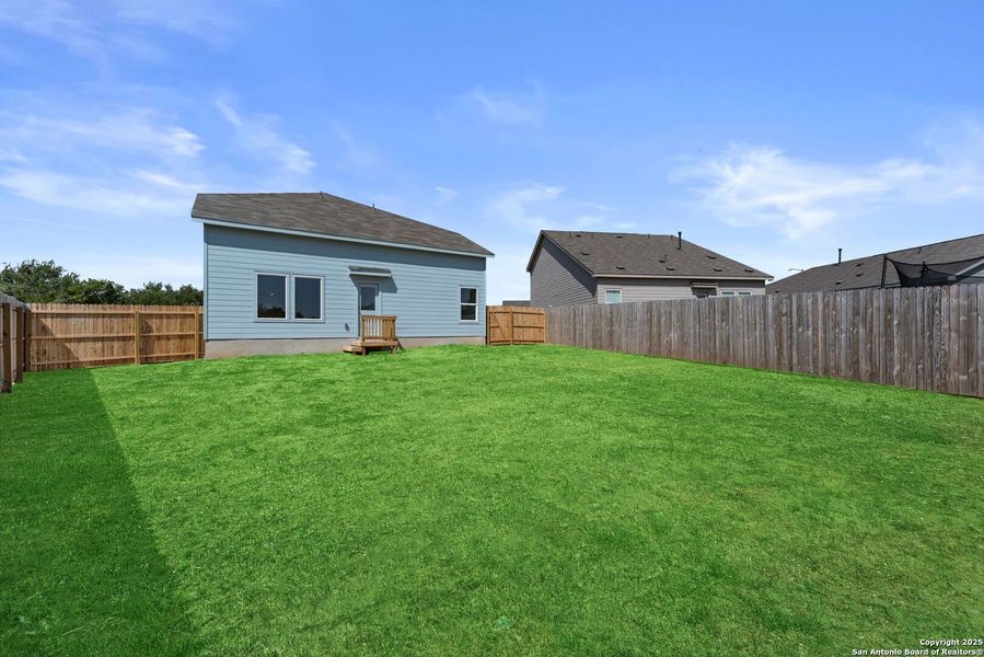 Exterior details and patio area of a home in Lodi Grove, Floresville (Image 2).