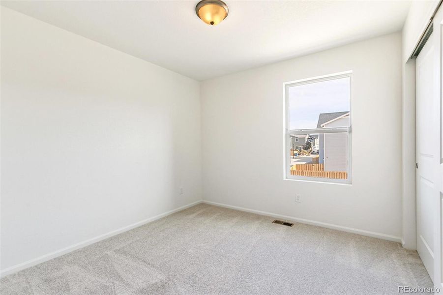 Spacious, unfurnished interior of a new home in Turnberry, Commerce City (Image 29).