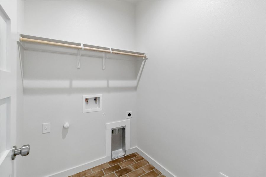 Laundry room featuring hookup for an electric dryer and washer hookup