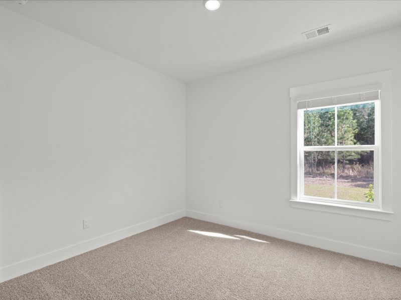 Spacious, unfurnished interior of a new home in The Coves at Lakes of Cane Bay, Summerville (Image 21). Spacious, unfurnished interior of a new home in The Coves at Lakes of Cane Bay, Summerville (Image 21).
