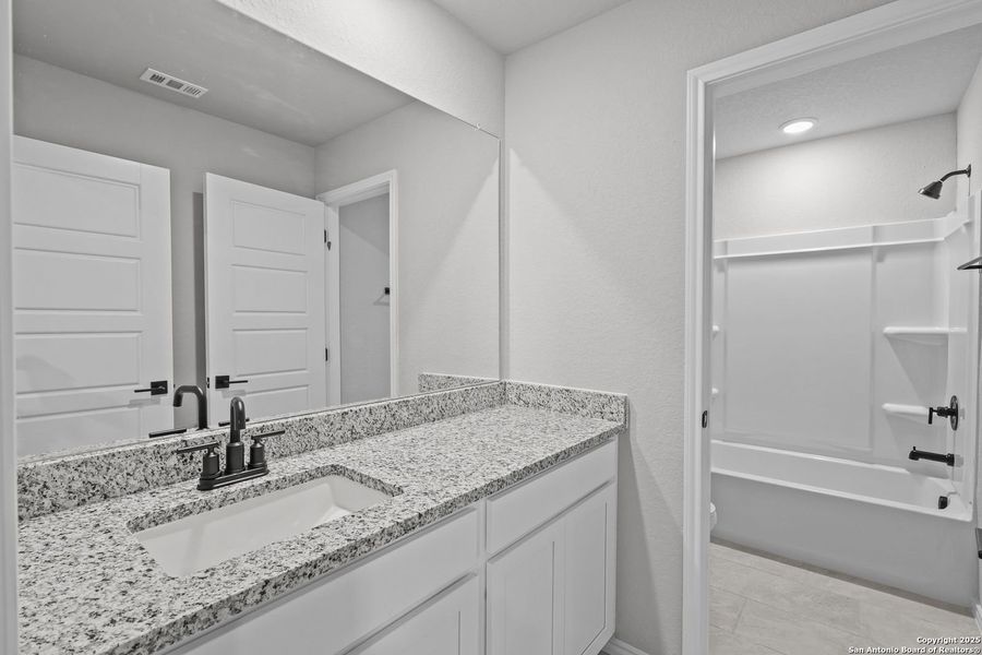 Furnished interior view inside a new home in Comanche Ridge, San Antonio (Image 64). Furnished interior view inside a new home in Comanche Ridge, San Antonio (Image 64).