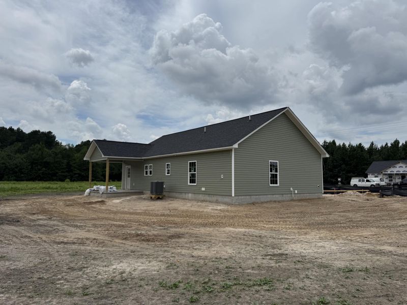 Front exterior of a new home in , St. George, SC, highlighting curb appeal (Image 12).