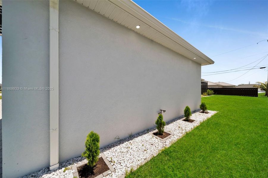 Front exterior of a new home in , Cape Coral, FL, highlighting curb appeal (Image 24).