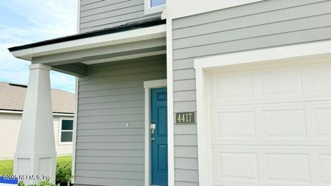 Exterior details and patio area of a home in Rookery, Green Cove Springs (Image 2).