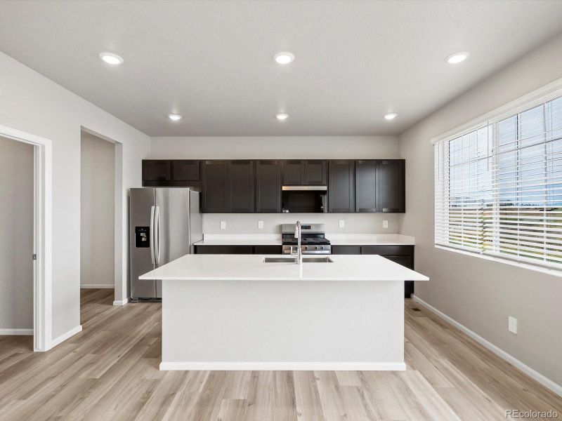 Furnished interior view inside a new home in Buffalo Highlands: The Canyon Collection, Commerce City (Image 10).