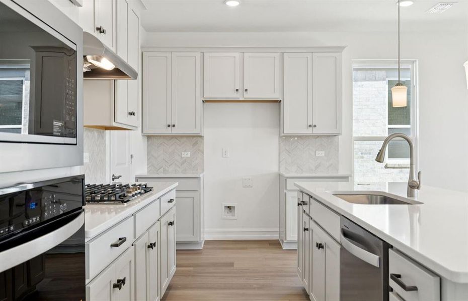 Abundant cabinet space in kitchen