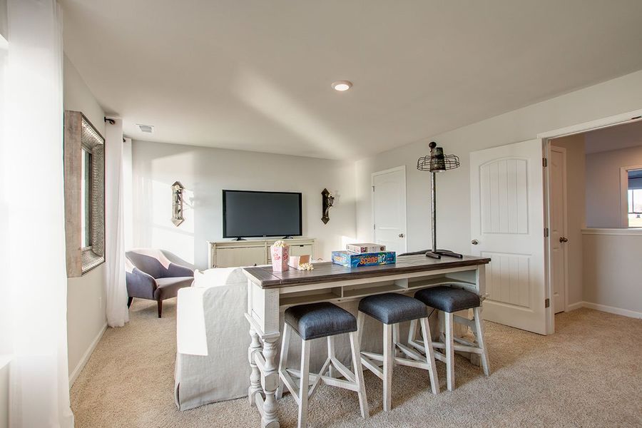 Representative furnished interior of a home built from the SALEM by D.R. Horton in The Parks, White House (Image 26).