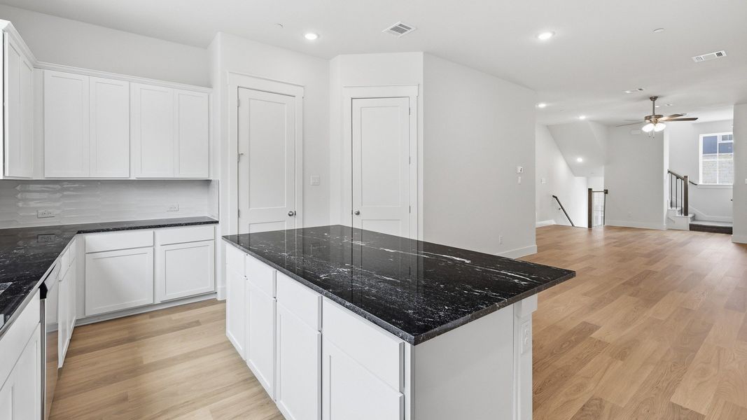 Furnished interior view inside a new home in Collin Creek, Plano (Image 27).