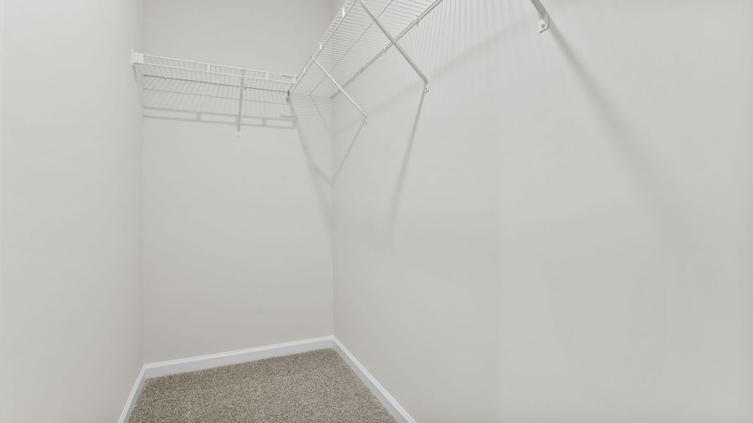 Spacious, unfurnished interior of a new home in Tanglewood Townes, Greenville (Image 28).