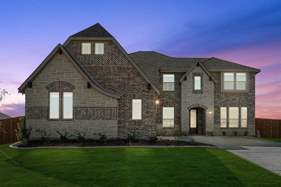 Front exterior of a new home in Coyote Crossing, Godley, TX, highlighting curb appeal (Image 2). Front exterior of a new home in Coyote Crossing, Godley, TX, highlighting curb appeal (Image 2).