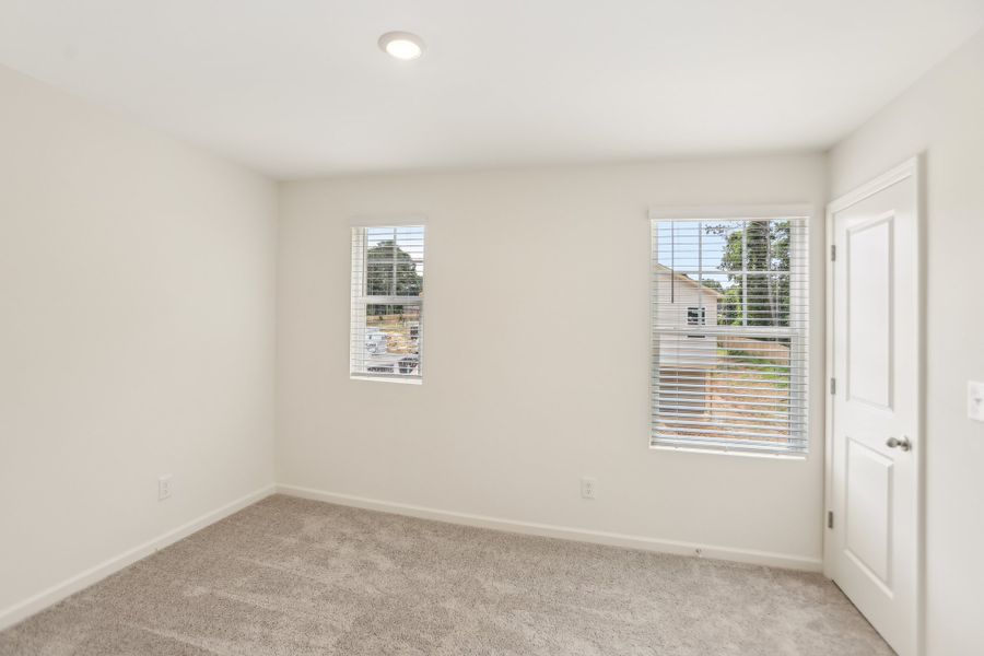 Representative unfurnished interior of a home built from the Triton by Starlight Homes in Chestnut Grove, Douglasville (Image 27).