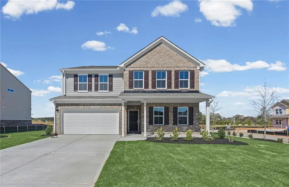 Front exterior of a new home in Anderson Point, McDonough, GA, highlighting curb appeal (Image 16).