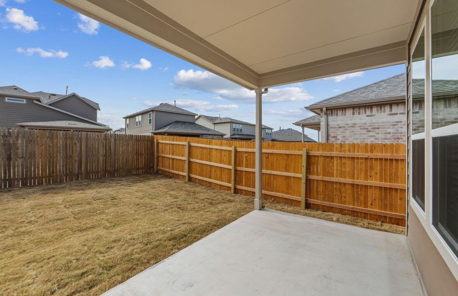 Exterior details and patio area of a home in Crosswinds, Kyle (Image 22).