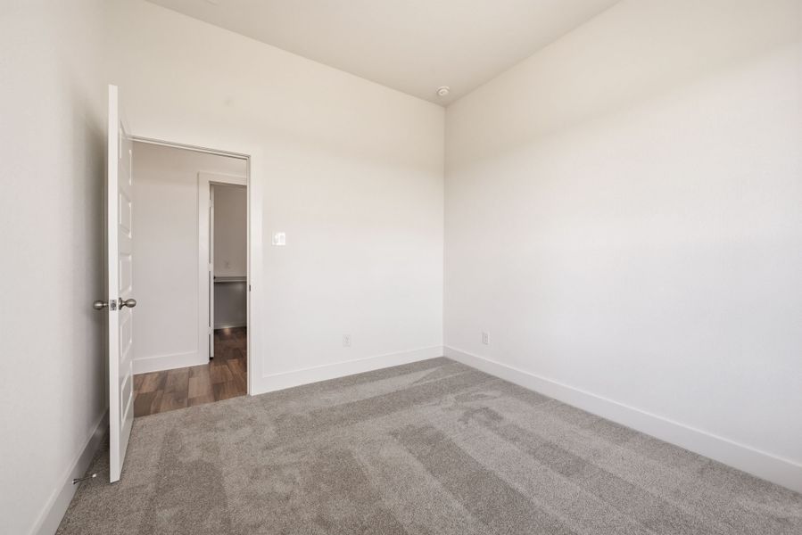 Spacious, unfurnished interior of a new home in Saddleback Estates, Boyd (Image 34).