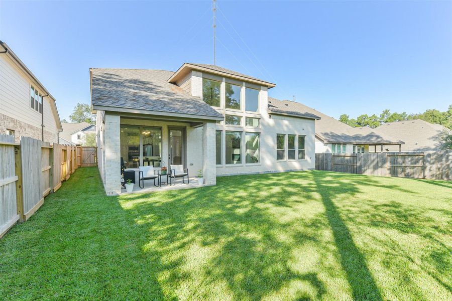 Front exterior of a new home in The Woodlands Hills – 55', Willis, TX, highlighting curb appeal (Image 24).