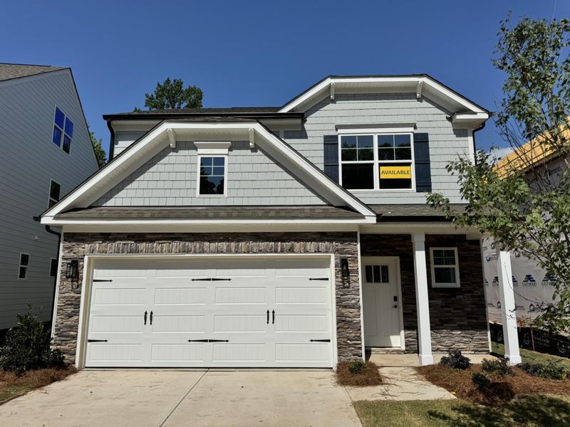 Front exterior of a new home in Caldwell Forest, Charlotte, NC, highlighting curb appeal (Image 1). Front exterior of a new home in Caldwell Forest, Charlotte, NC, highlighting curb appeal (Image 1).