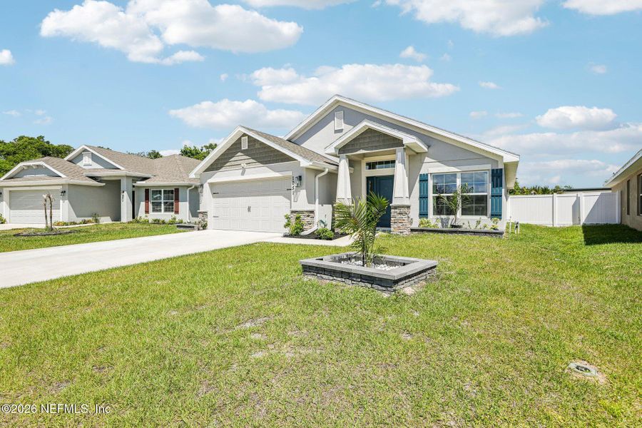 Front exterior of a new home in , Cocoa, FL, highlighting curb appeal (Image 21).