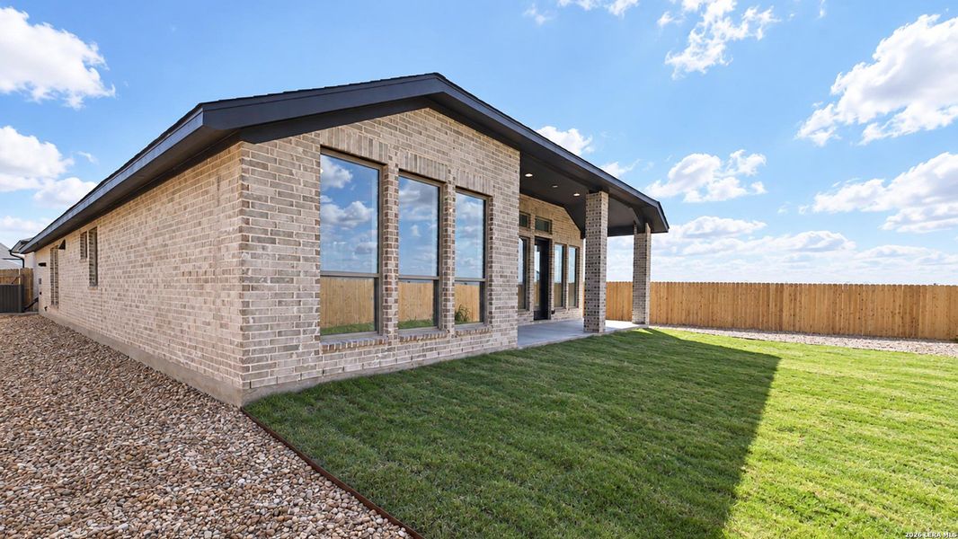 Exterior details and patio area of a home in Legacy at Lake Dunlap, New Braunfels (Image 22).