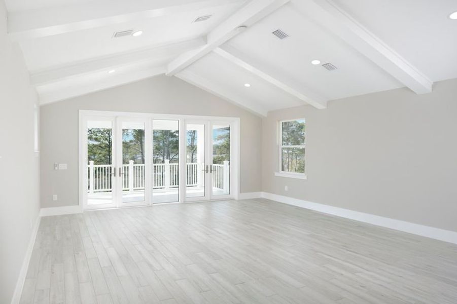 Representative unfurnished interior of a home built from the Grand Mainsail by Minto Communities in Latitude Margaritaville Watersound, Panama City Beach (Image 19).