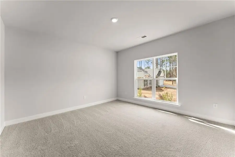 Representative unfurnished interior of a home built from the 2620 by Adams Homes in Williams Ridge, Bailey (Image 38). Representative unfurnished interior of a home built from the 2620 by Adams Homes in Williams Ridge, Bailey (Image 38).