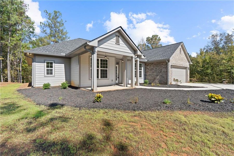 Front exterior of a new home in , Gray, GA, highlighting curb appeal (Image 26).