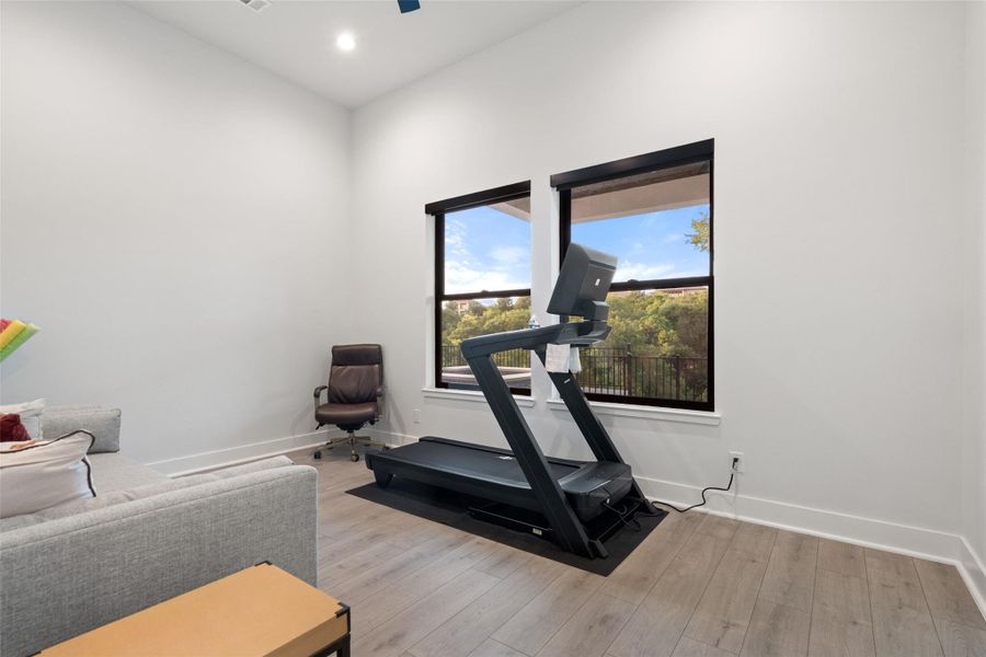 . Three additional ensuite bedrooms provide generous accommodations for family and guests alike.