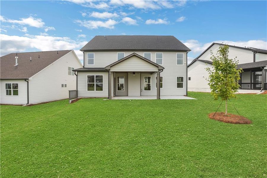 Exterior details and patio area of a home in Twin Lakes, Hoschton (Image 32).