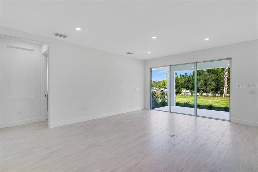 Spacious, unfurnished interior of a new home in Esplanade at Westview, Kissimmee (Image 24).
