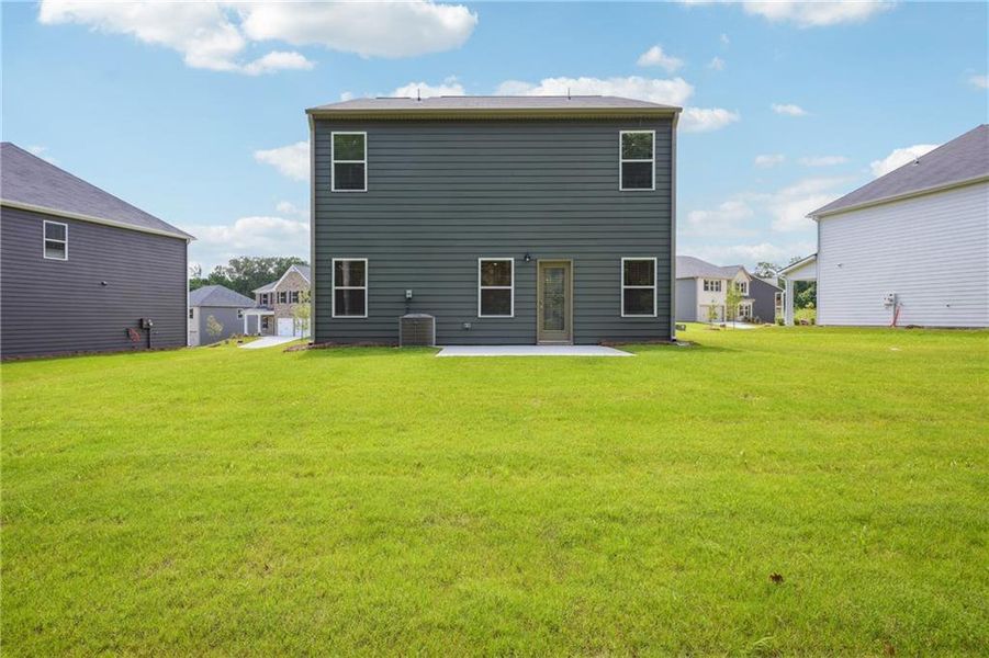Front exterior of a new home in River Walk Farm, Covington, GA, highlighting curb appeal (Image 19).