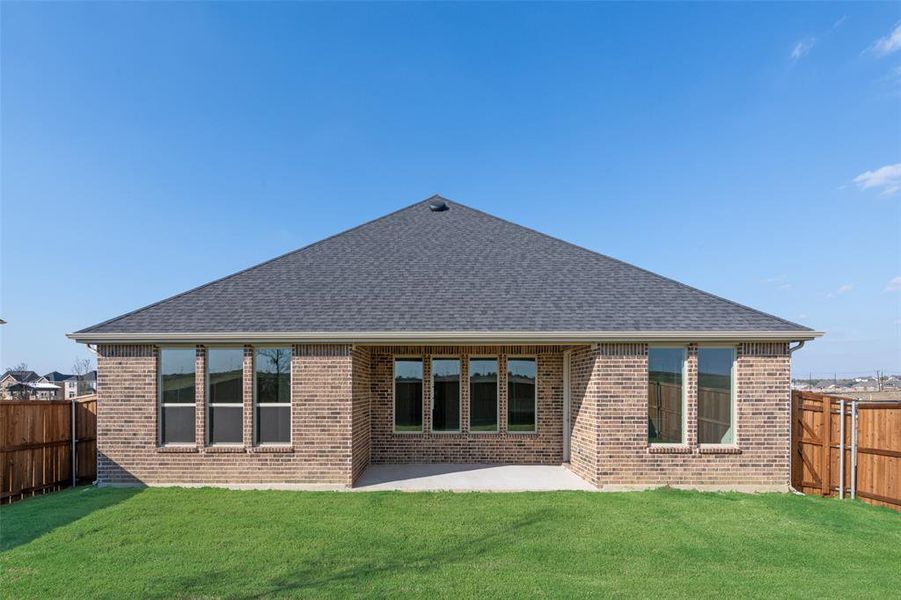 Exterior details and patio area of a home in Arbors at Legacy Hills, Celina (Image 19).