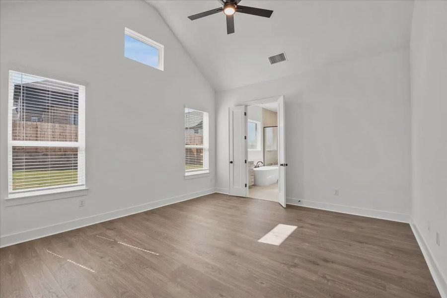 Representative unfurnished interior of a home built from the Courtney by Chesmar Homes in 6 Creeks, Kyle (Image 12).