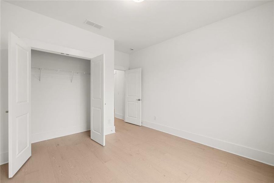 Spacious, unfurnished interior of a new home in Soleil Belmont Park, Canton (Image 44).