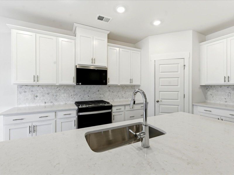 Furnished interior view inside a new home in The Coves at Lakes of Cane Bay II, Summerville (Image 18).