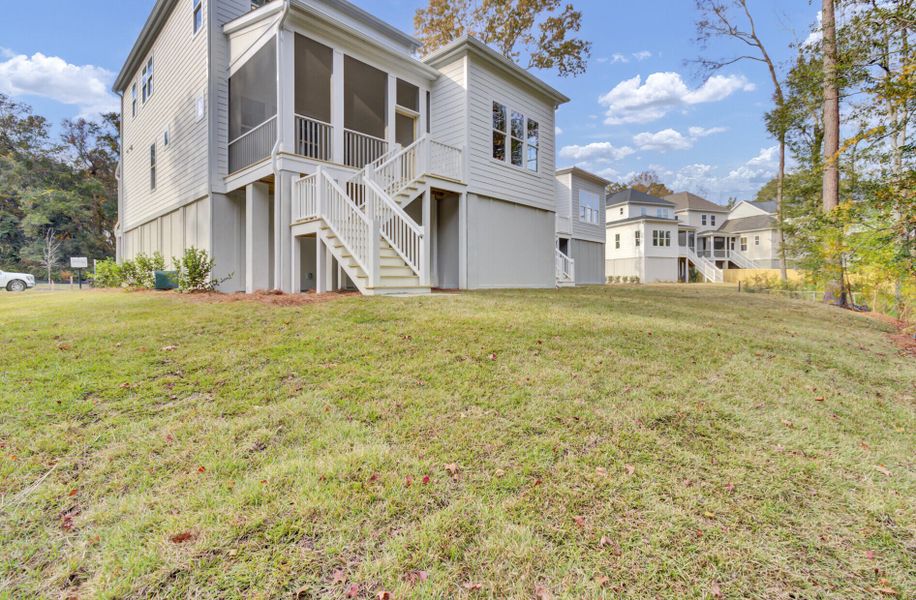 Exterior details and patio area of a home in , Johns Island (Image 26).