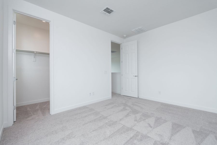 Spacious, unfurnished interior of a new home in Soleo, Queen Creek (Image 13).