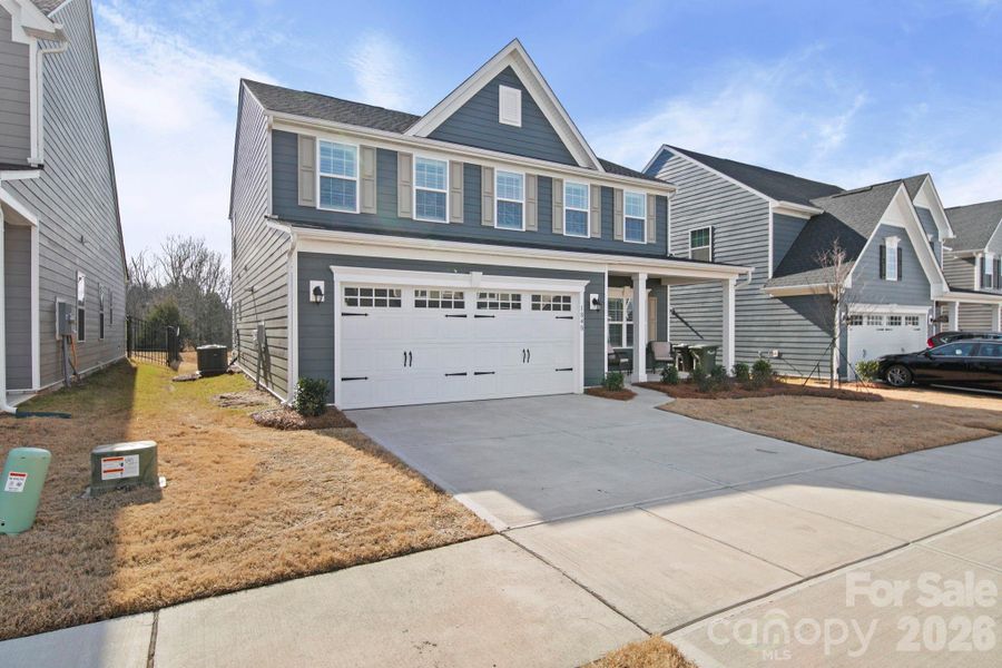 Front exterior of a new home in , Monroe, NC, highlighting curb appeal (Image 25).