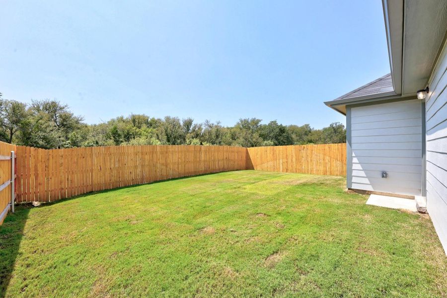 Exterior details and patio area of a home in Trinity Ranch, Elgin (Image 3). Exterior details and patio area of a home in Trinity Ranch, Elgin (Image 3).