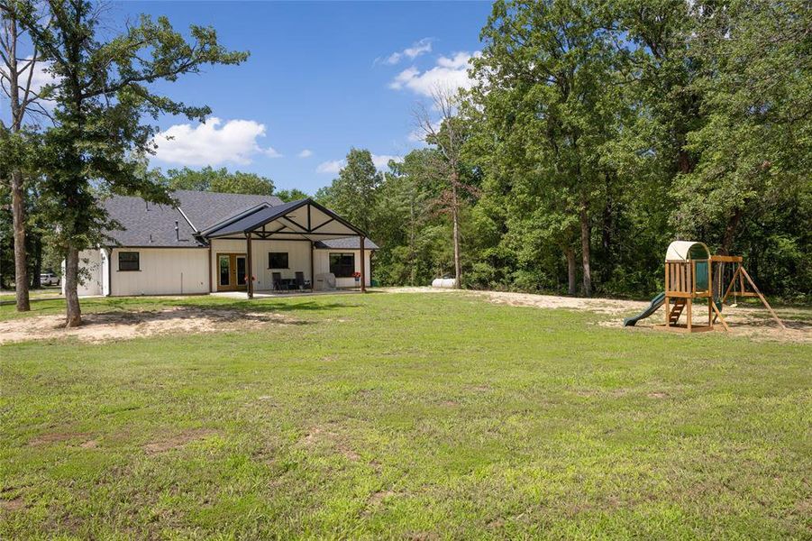 Exterior details and patio area of a home in , Powderly (Image 19).