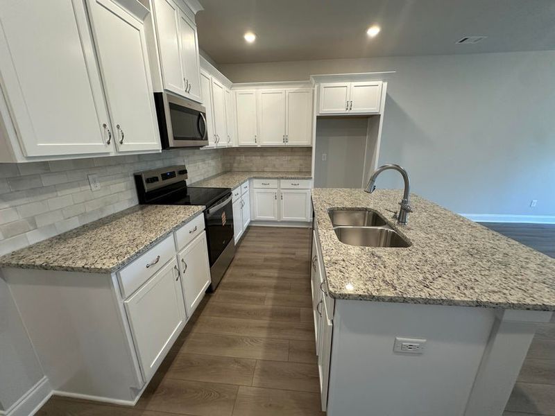 Furnished interior view inside a new home in Windsor Townhomes, North Augusta (Image 5).
