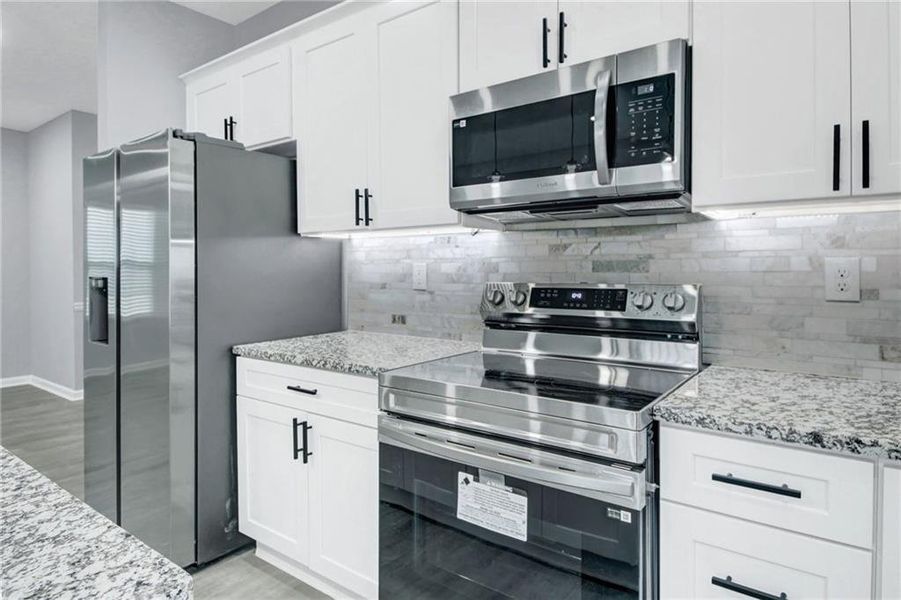 Furnished interior view inside a new home in , Austell (Image 11).