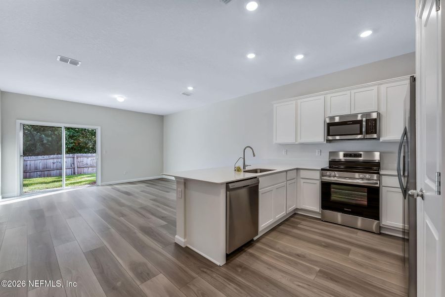 Furnished interior view inside a new home in , Orange Park (Image 5).