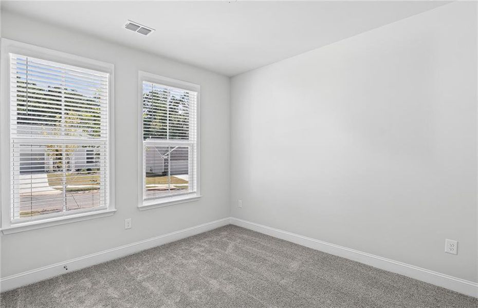 Spacious, unfurnished interior of a new home in Sun City Peachtree, Griffin (Image 15).