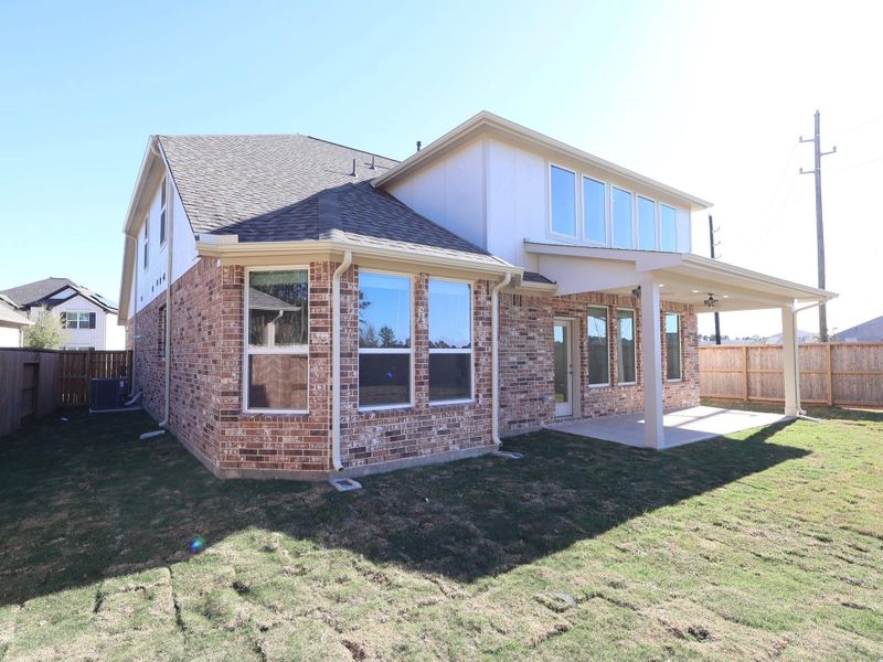 Exterior details and patio area of a home in Sorella, Tomball (Image 4).