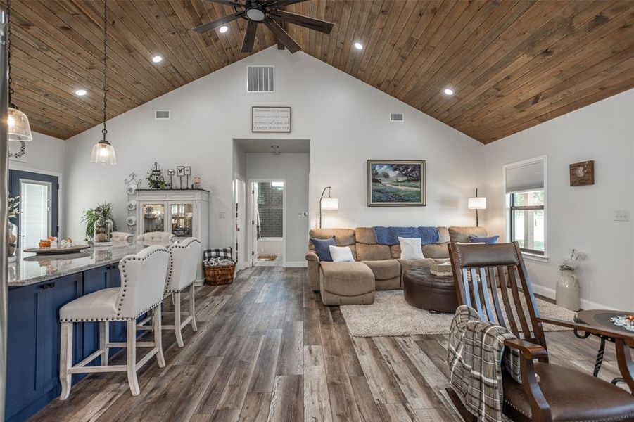 View of Island and living room showing the open floor plan looking into the hallway and second bath